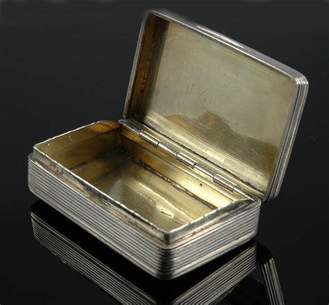 Metal Snuff Boxes and Tobacco 